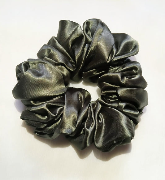 Soft silk scrunchies, perfect for everyday wear or special occasions. Stylish and gentle on hair for a smooth, comfortable hold