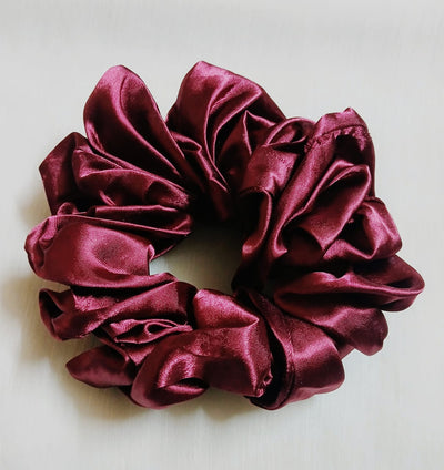 Soft silk scrunchies, perfect for everyday wear or special occasions. Stylish and gentle on hair for a smooth, comfortable hold