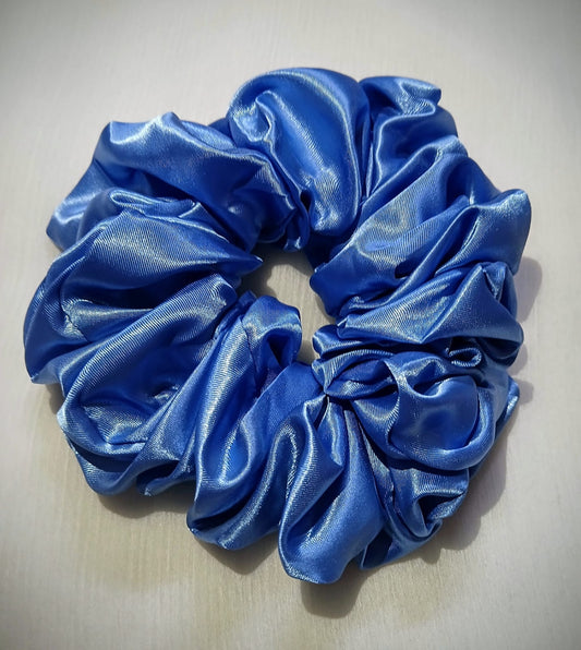 Soft silk scrunchies, perfect for everyday wear or special occasions. Stylish and gentle on hair for a smooth, comfortable hold