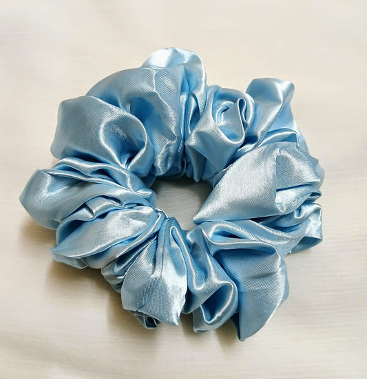 Soft silk scrunchies, perfect for everyday wear or special occasions. Stylish and gentle on hair for a smooth, comfortable hold