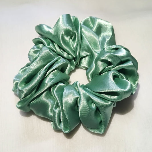 Soft silk scrunchies, perfect for everyday wear or special occasions. Stylish and gentle on hair for a smooth, comfortable hold